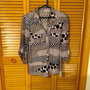 Women’s size large blouse.